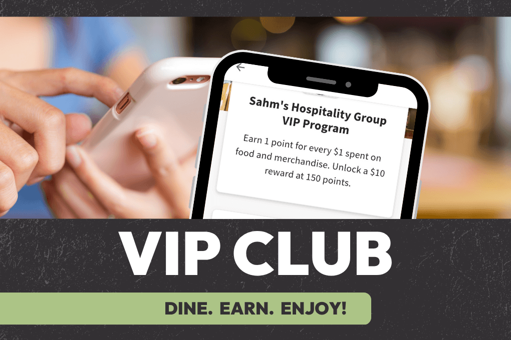 A hand holding a cell phone with another cell phone in front displaying a reward earned with the VIP Club. Below the text: 